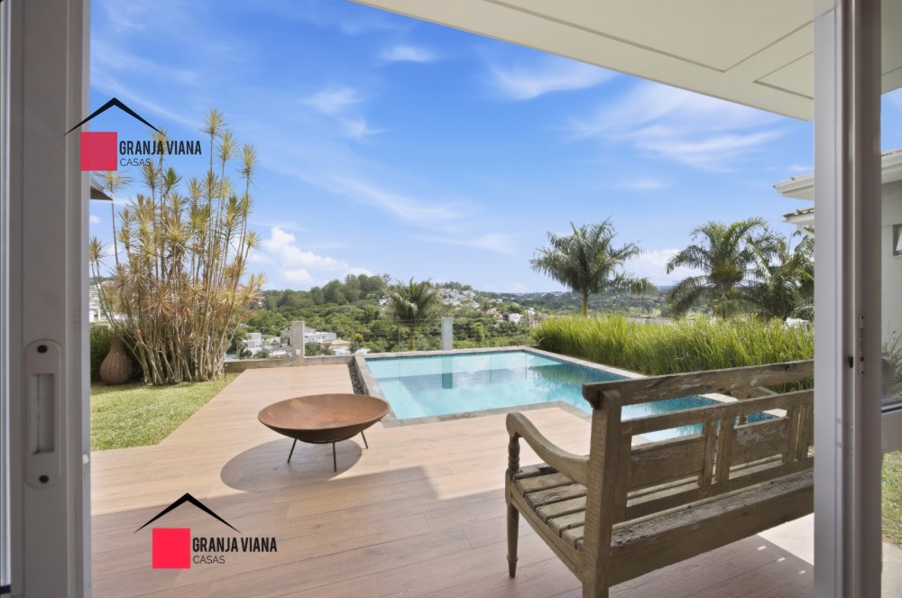Casa semimobiliada à venda no condomínio Golf Village com vista para horizonte foto 25