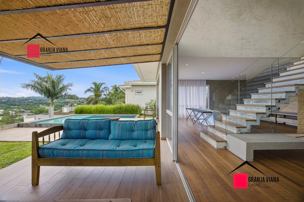 Casa semimobiliada à venda no condomínio Golf Village com vista para horizonte foto 5